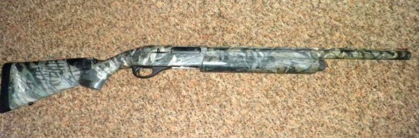 Remington 11-87 camouflage Special Purpose  #PC639477, 12 ga - Calvin Clamme Estate - Farm Equipment & Gun Inventory Auction